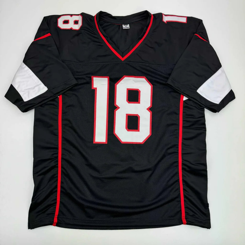 Black custom jersey with white numbers outlined in red for professional sports league fans