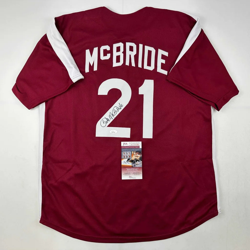 Autographed maroon and white custom jersey with number 21 from professional sports league