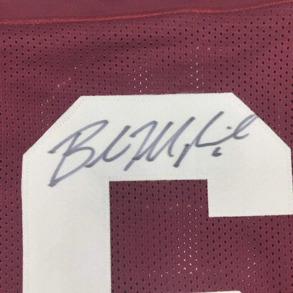 Maroon mesh custom football jersey with white number patch and autograph from professional sports league player baker mayfield