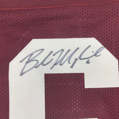 Maroon mesh custom football jersey with white number patch and autograph from professional sports league player baker mayfield
