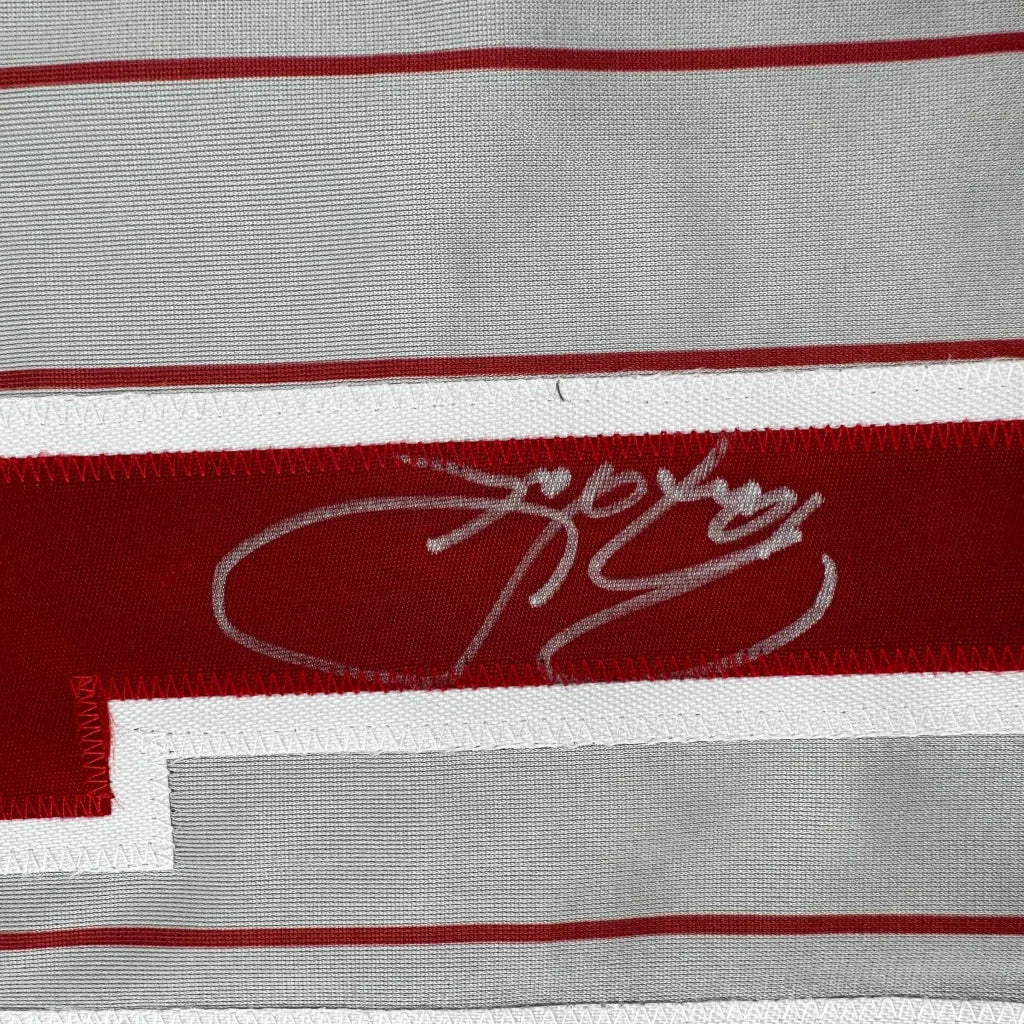 Autographed Barry Larkin custom jersey in red white stripes, Beckett COA
