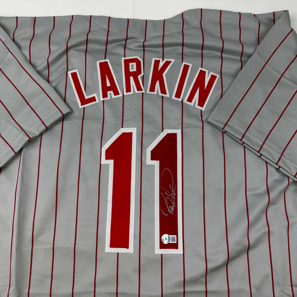 Autographed Barry Larkin gray pinstripe custom jersey with red number 11, Beckett COA