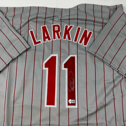 Autographed Barry Larkin gray pinstripe custom jersey with red number 11, Beckett COA