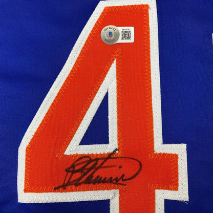 Autographed blue custom jersey with number 4 from a professional sports league
