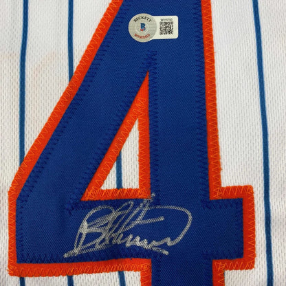 Autographed white and blue pinstriped custom jersey from a professional sports league