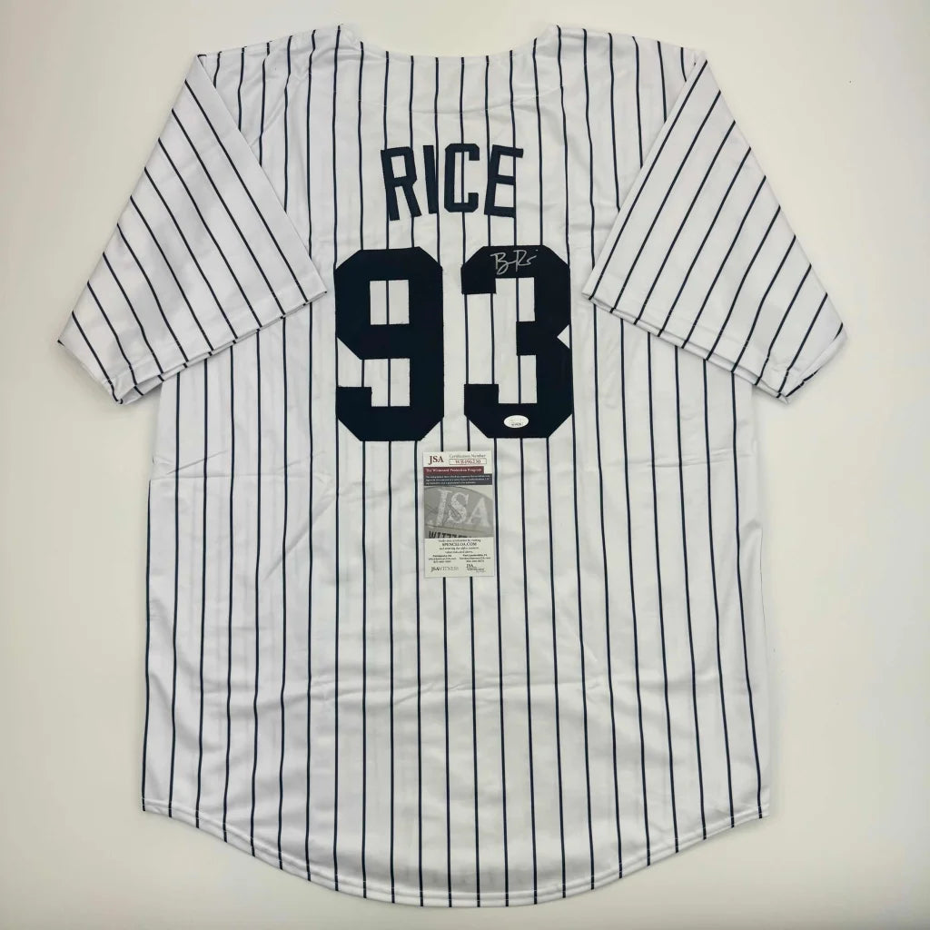 Back of white pinstripe baseball custom jersey with rice 93 in bold navy lettering for professional sports league use