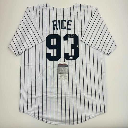 Back of white pinstripe baseball custom jersey with rice 93 in bold navy lettering for professional sports league use