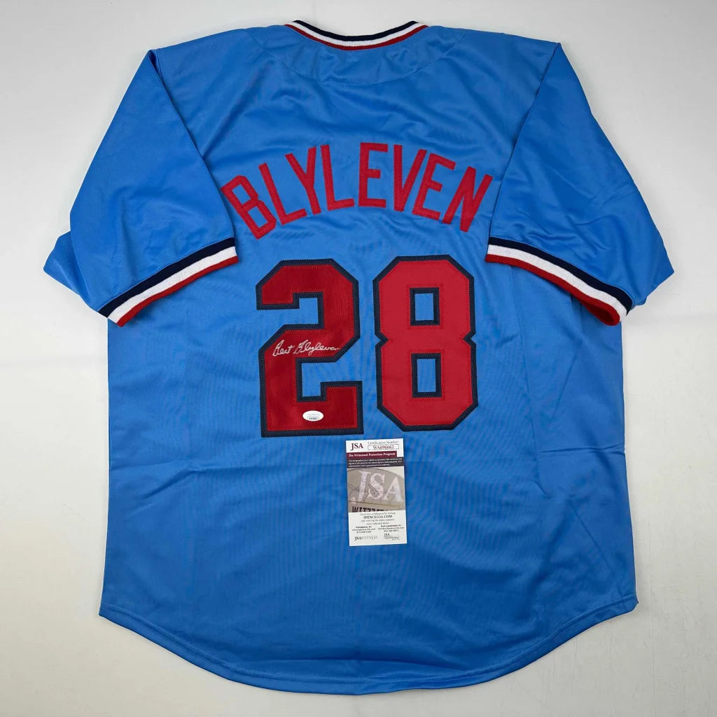 Signed Bert Blyleven custom jersey with light blue, red lettering, and striped sleeves