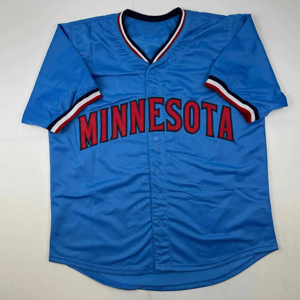 Light blue custom jersey with red, white, and blue trim from professional sports league