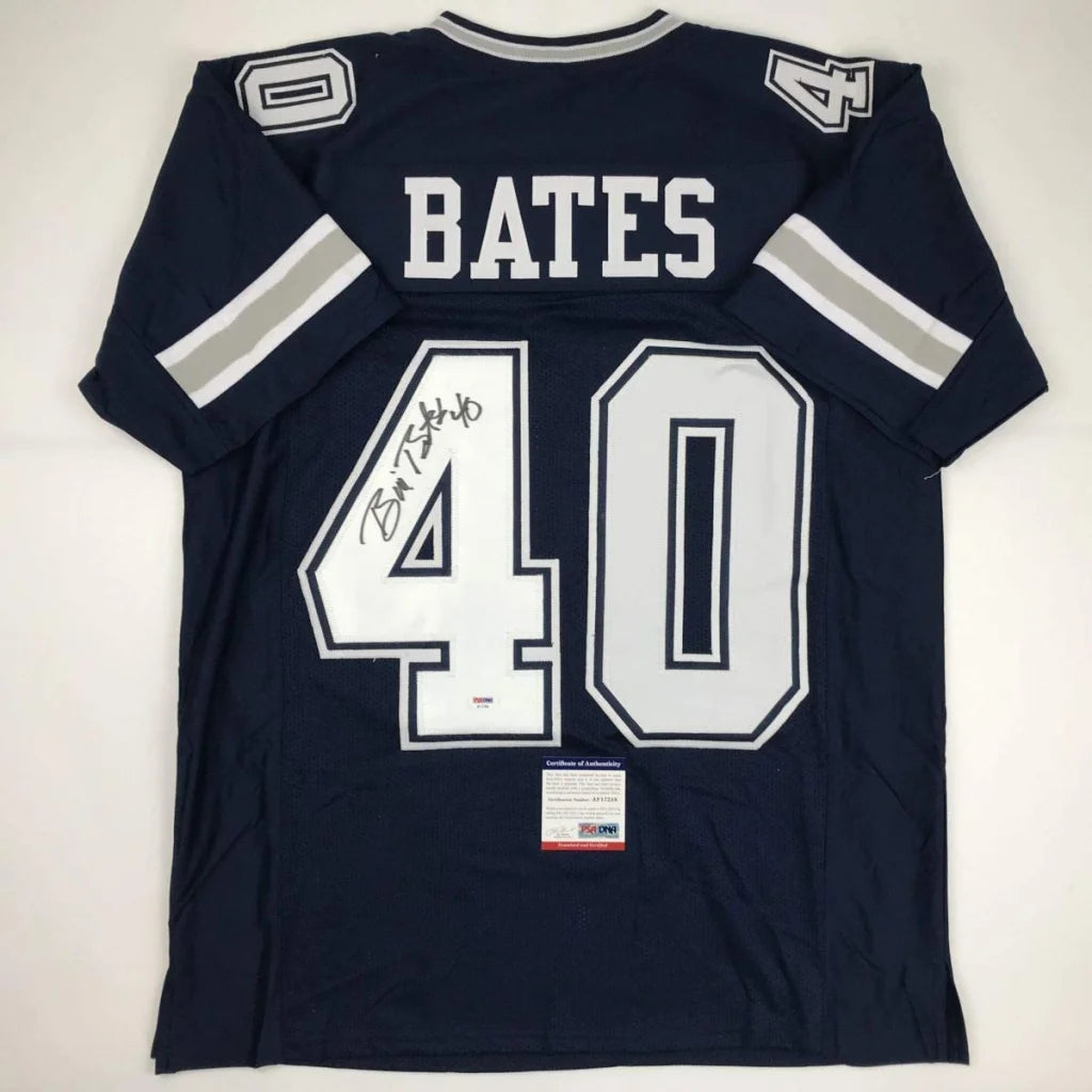 Back of a navy blue bill bates dallas cowboys custom jersey with white and silver lettering signed by brian c for professional sports league fans