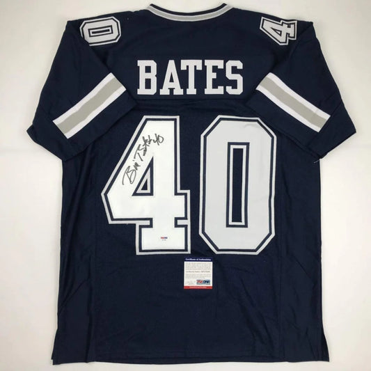 Back of a navy blue bill bates dallas cowboys custom jersey with white and silver lettering signed by brian c for professional sports league fans