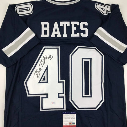 Back of a navy blue dallas cowboys custom jersey signed by bill bates with white and silver lettering number 40 professional sports league