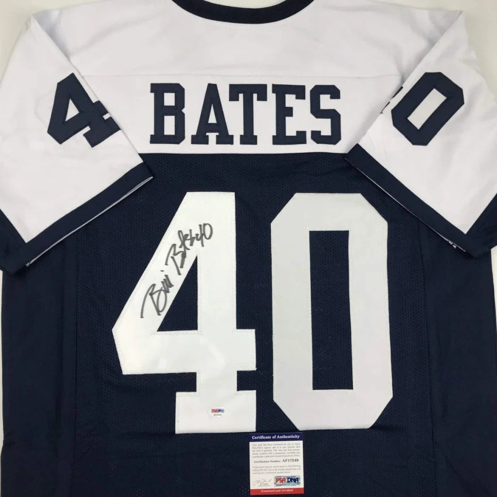 Back side of a white and navy blue custom jersey signed by bill bates featuring name bates and number 40 from professional sports league