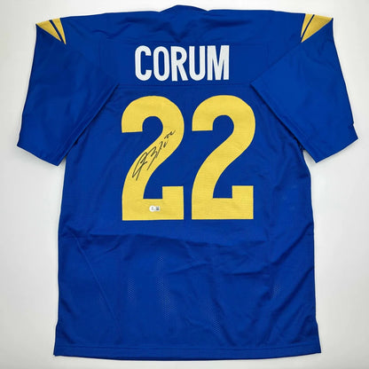 Blue and yellow custom jersey with signature from a professional sports league star