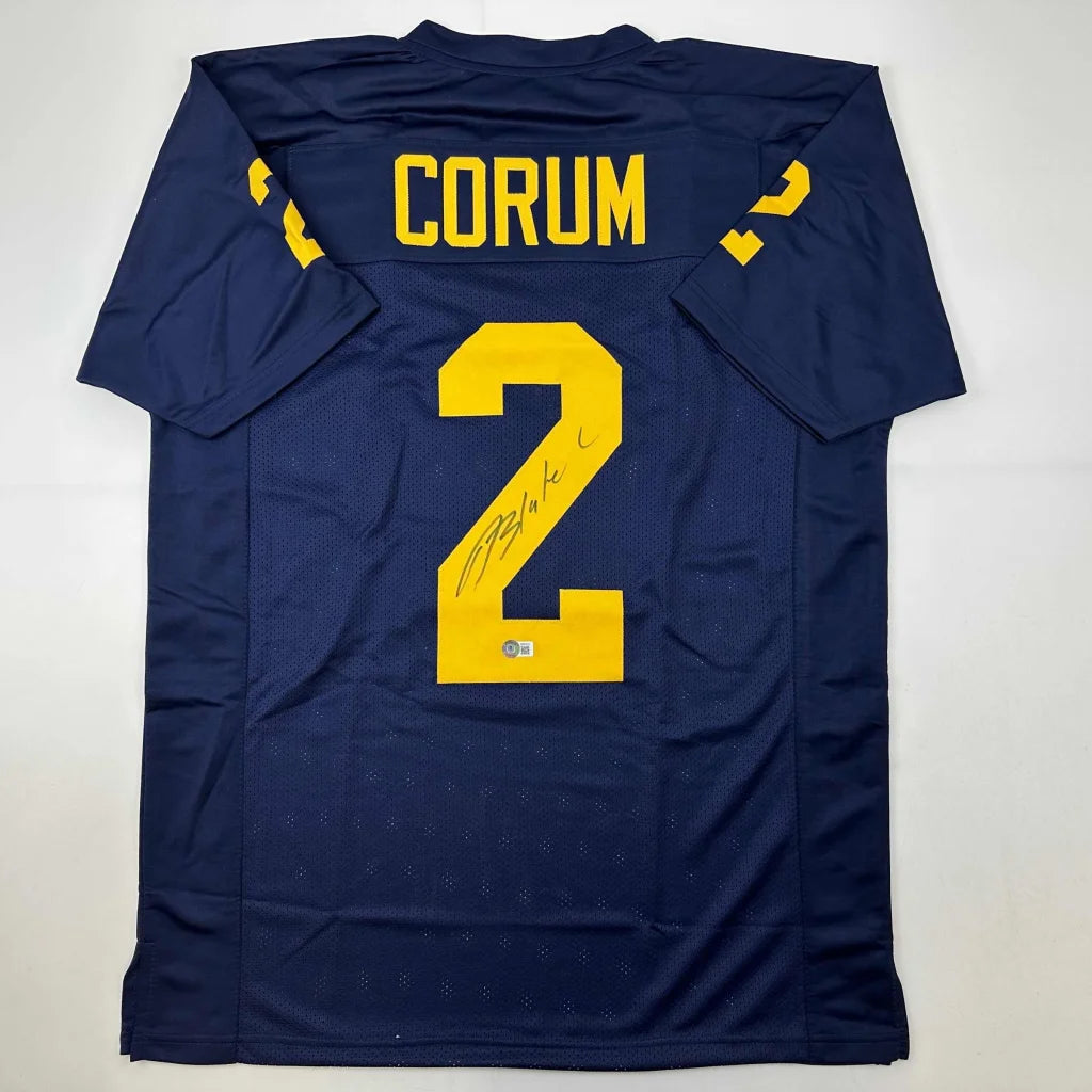 Signed Blake Corum navy blue custom jersey for professional sports collectibles