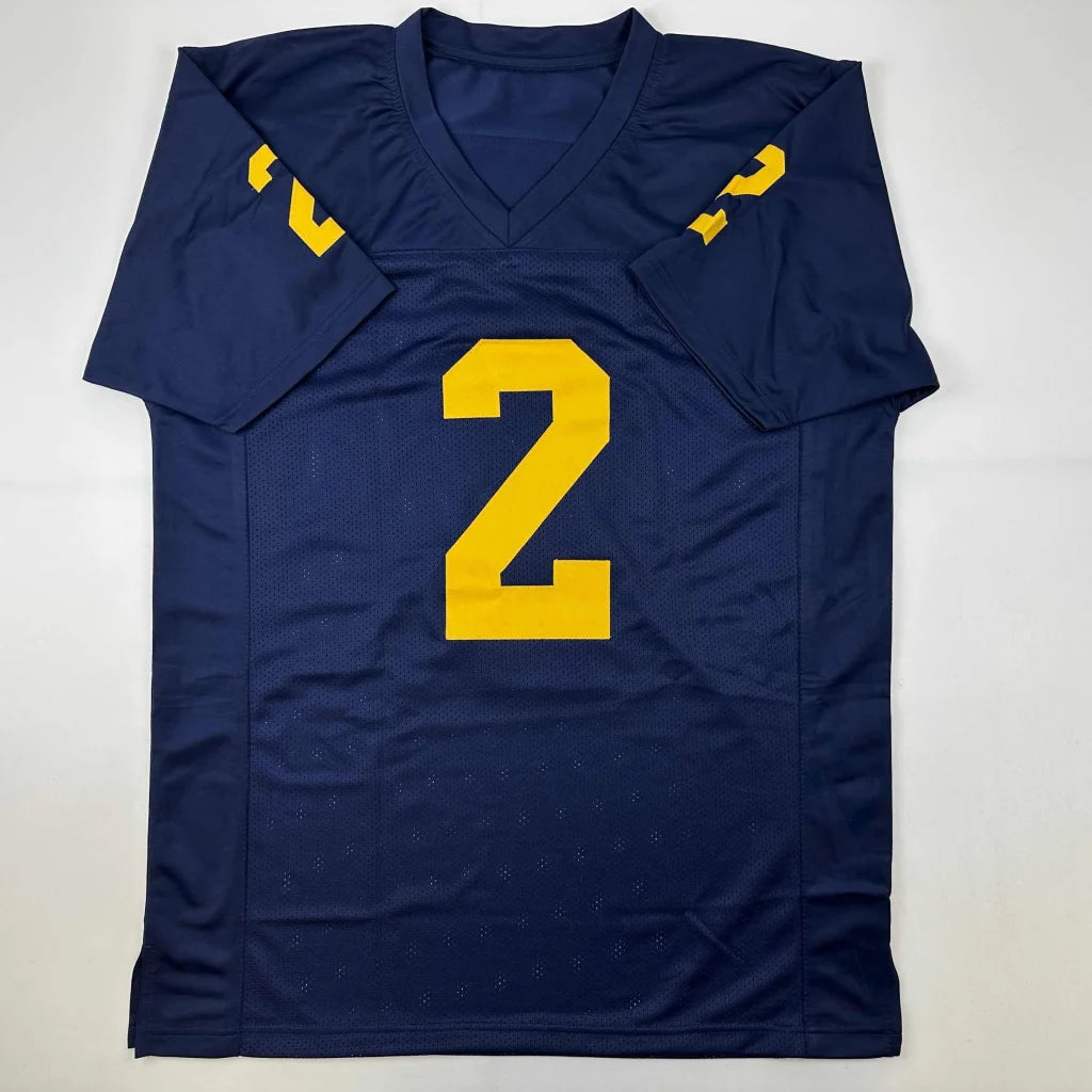 Navy blue custom jersey with yellow number 2 from Blake Corum for professional sports fans