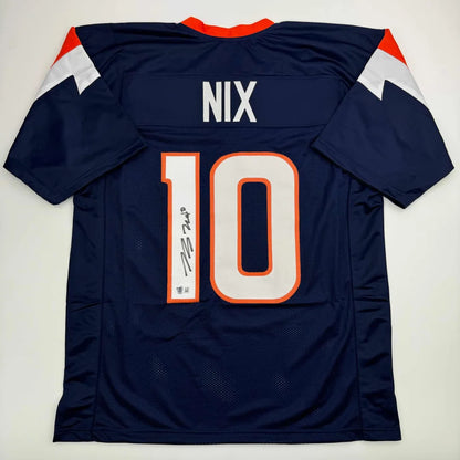 Navy blue autographed bo nix football custom jersey with orange white accents and number 10 from professional sports league