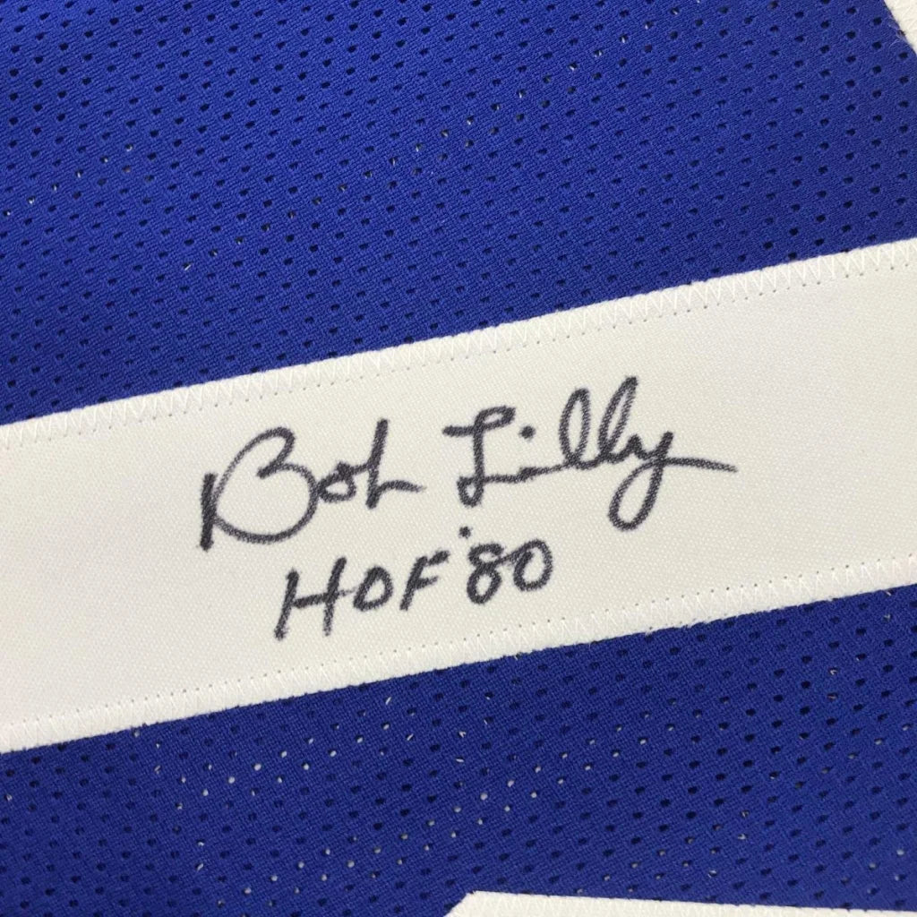 Blue athletic jersey with a white stripe, perfect for professional sports fans and custom jersey collectors