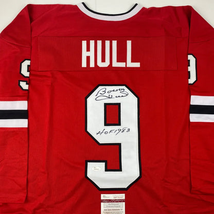 Red Bobby Hull HOF custom jersey signed by hockey legend, perfect for pro sports fans