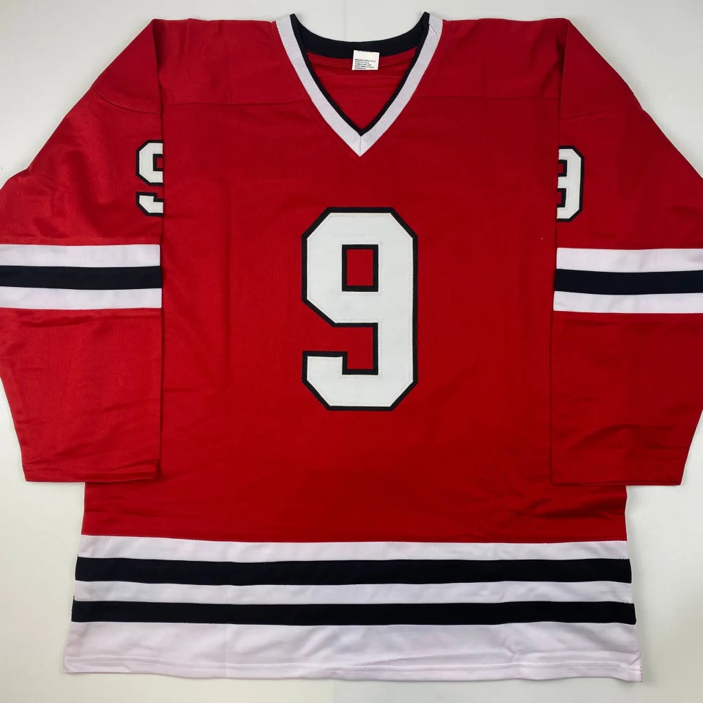 Red hockey jersey with white and black stripes and number 9 for Bobby Hull HOF custom jersey
