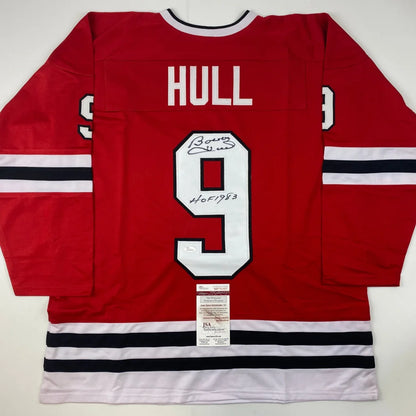 Red Bobby Hull HOF custom jersey signed by Bobby Hull with Hall of Fame inscription for professional sports fans