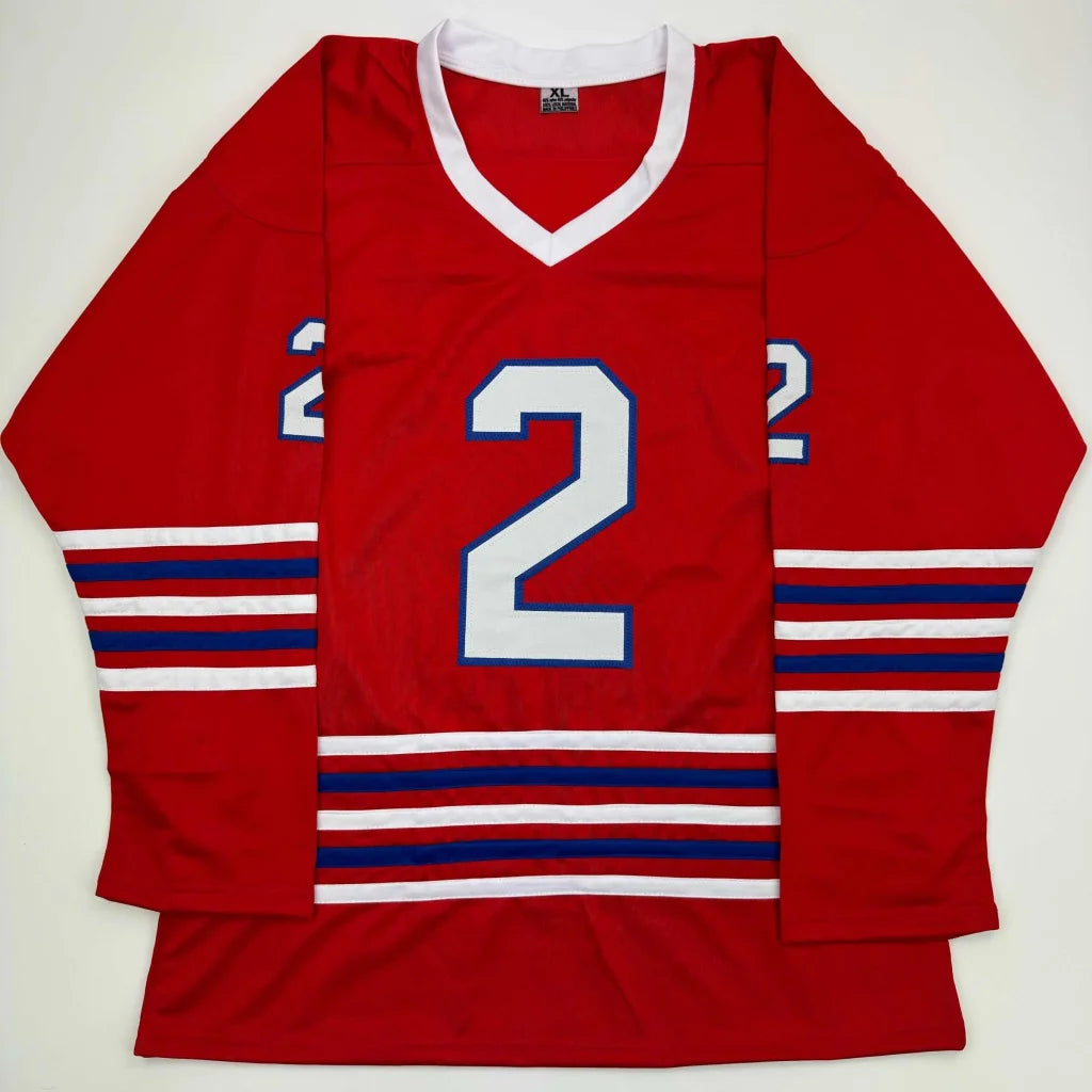 Red custom Bobby Orr hockey jersey with white and blue striped cuffs and waist