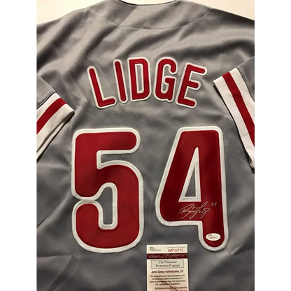 Autographed Brad Lidge Philadelphia grey baseball jersey with red white trim for professional sports fans
