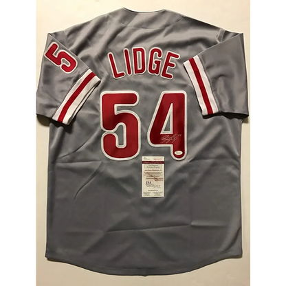 Grey Brad Lidge signed baseball jersey with JSA COA, perfect for pro sports fans