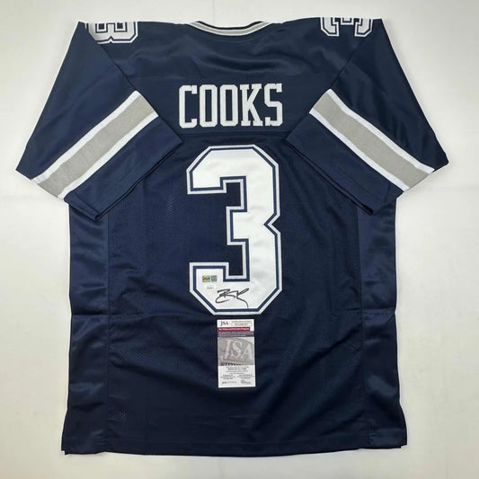 Dark blue professional sports league custom jersey with white gray accents and autograph