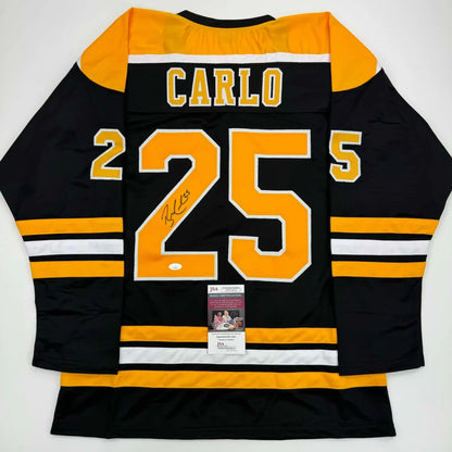 Autographed black and gold Boston Bruins custom jersey with Carlo 25
