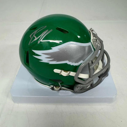 Green Philadelphia Eagles mini football helmet with silver signature and third party authentication
