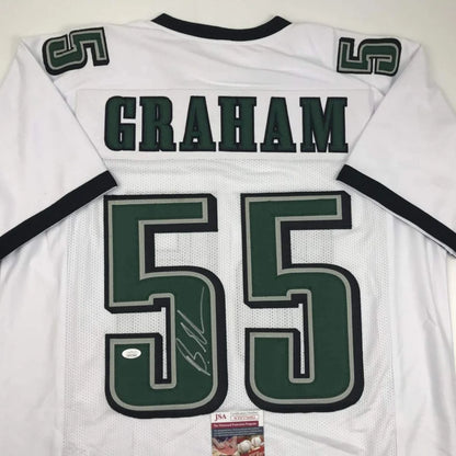 White GRAHAM 55 custom jersey from professional sports league with signature and auth sticker