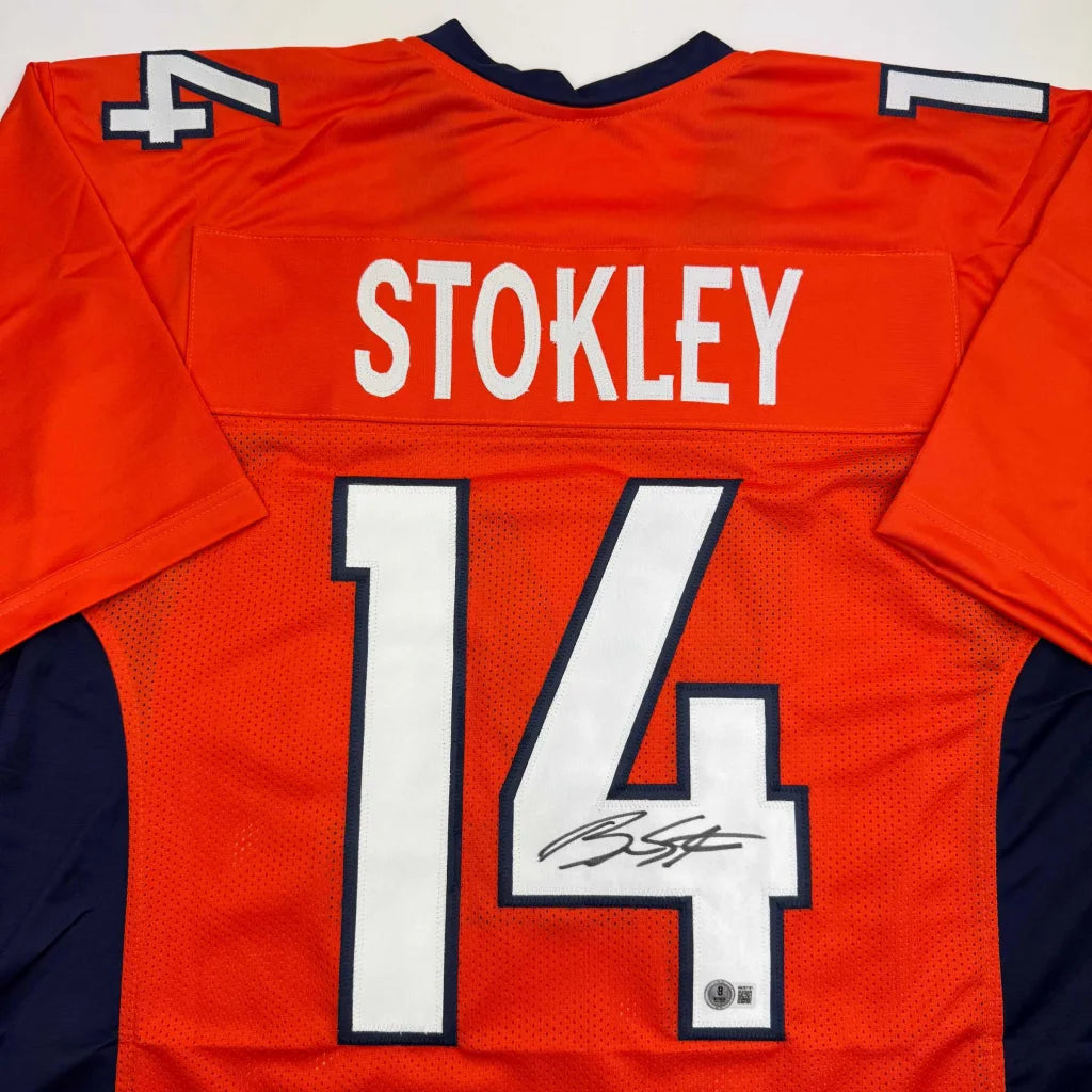 Autographed Brandon Stokley Denver Orange Football Jersey Beckett BAS COA | Certified Authentic Signed Memorabilia | vintageantiquesgifts.com