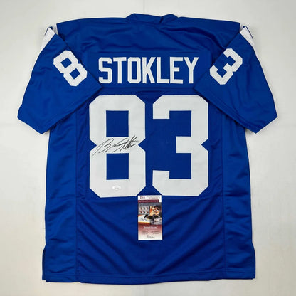 Autographed blue football jersey with number 83 from a professional sports league