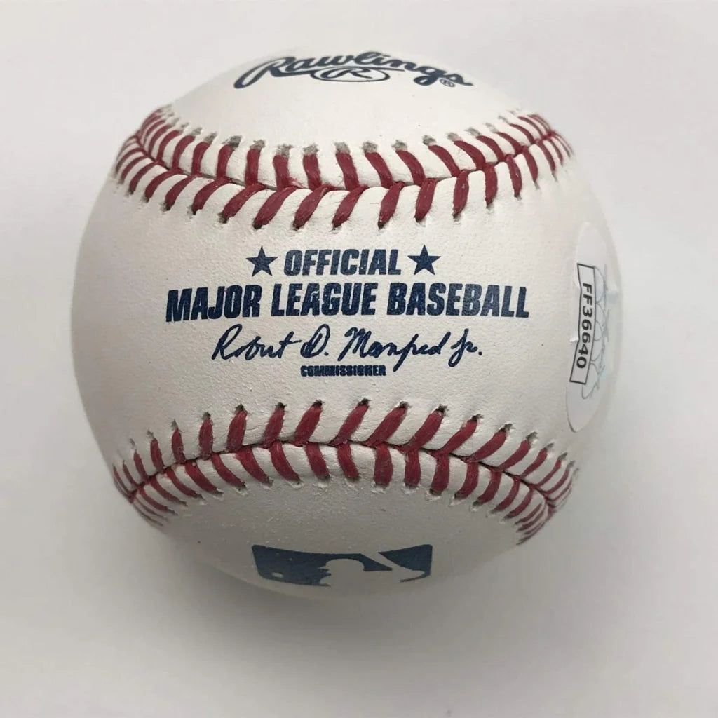 Authentic MLB autographed baseball with red stitching and official logos, JSA certified