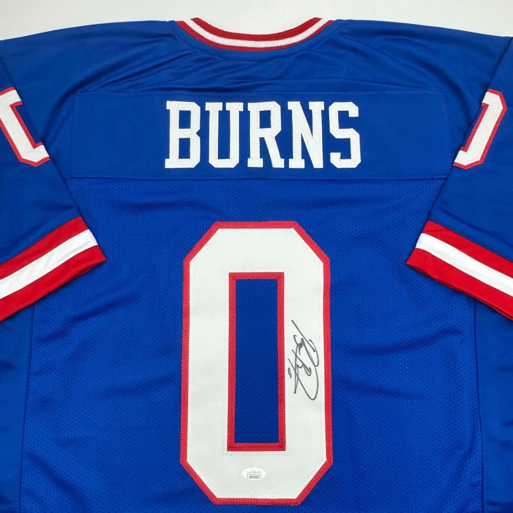 Back of autographed Brian Burns New York retro blue custom football jersey with Burns 0, JSA COA