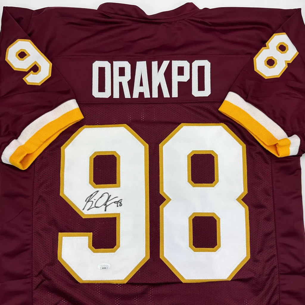 Autographed Brian Orakpo Washington Burgundy Football Jersey JSA COA | Certified Authentic Signed Memorabilia | vintageantiquesgifts.com