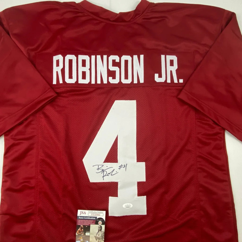 Back side of crimson Alabama Crimson Tide custom football jersey signed by Brian Robinson Jr number 4 with JSA COA