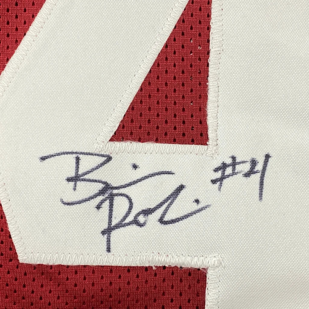 Autographed white and red mesh custom jersey of brian robinson jr with stitched number 21 from a professional sports league