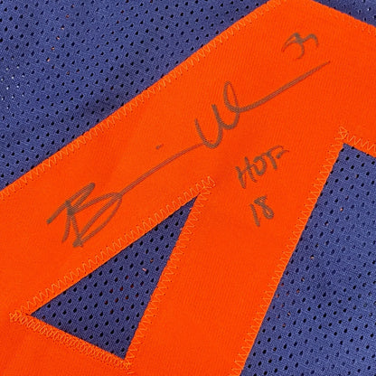 Autographed orange and blue custom jersey from professional sports featuring Brian Urlacher