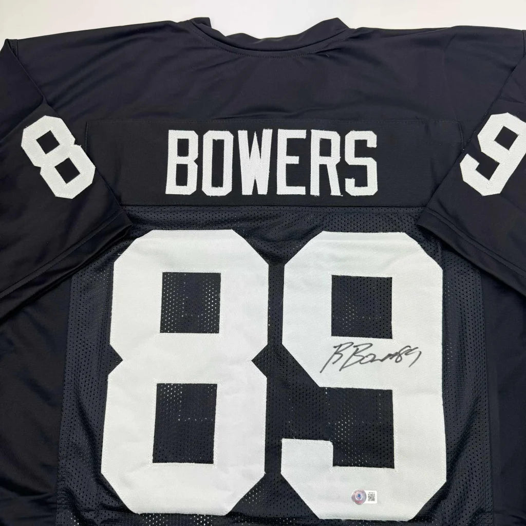 Autographed Brock Bowers Las Vegas Oakland Black Football Jersey Beckett BAS COA | Certified Authentic Signed Memorabilia | vintageantiquesgifts.com