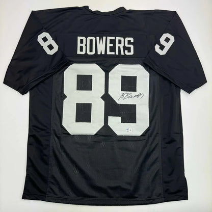 Autographed Brock Bowers Las Vegas Oakland Black Football Jersey Beckett BAS COA | Hall of Fame Sports Memorabilia | vintageantiquesgifts.com