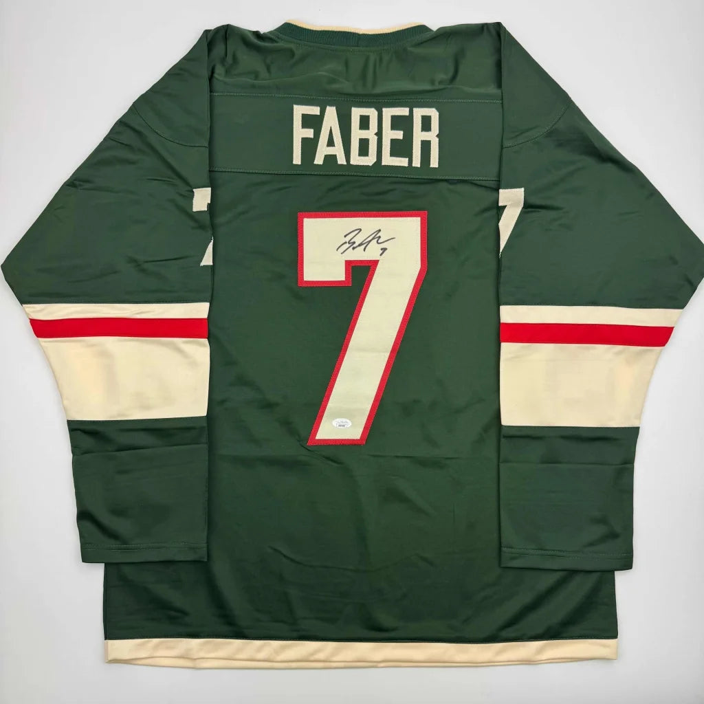 Autographed Brock Faber Minnesota Green Hockey Jersey JSA COA | Hall of Fame Sports Memorabilia | vintageantiquesgifts.com