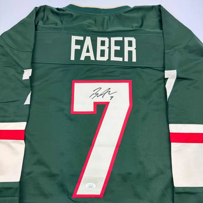 Autographed Brock Faber Minnesota Green Hockey Jersey JSA COA | Certified Authentic Signed Memorabilia | vintageantiquesgifts.com