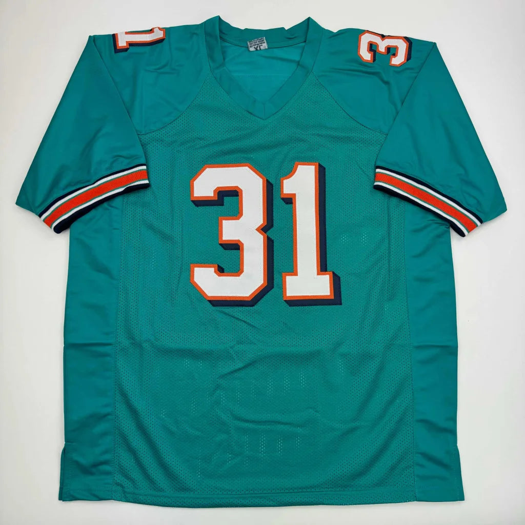 Teal professional sports league jersey with number 31 and orange trim, ready to own