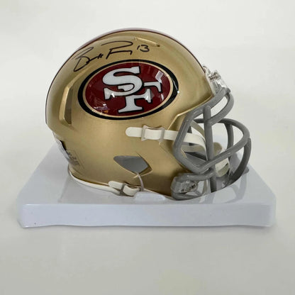 Gold and red San Francisco 49ers mini helmet with grey facemask and third party authentication