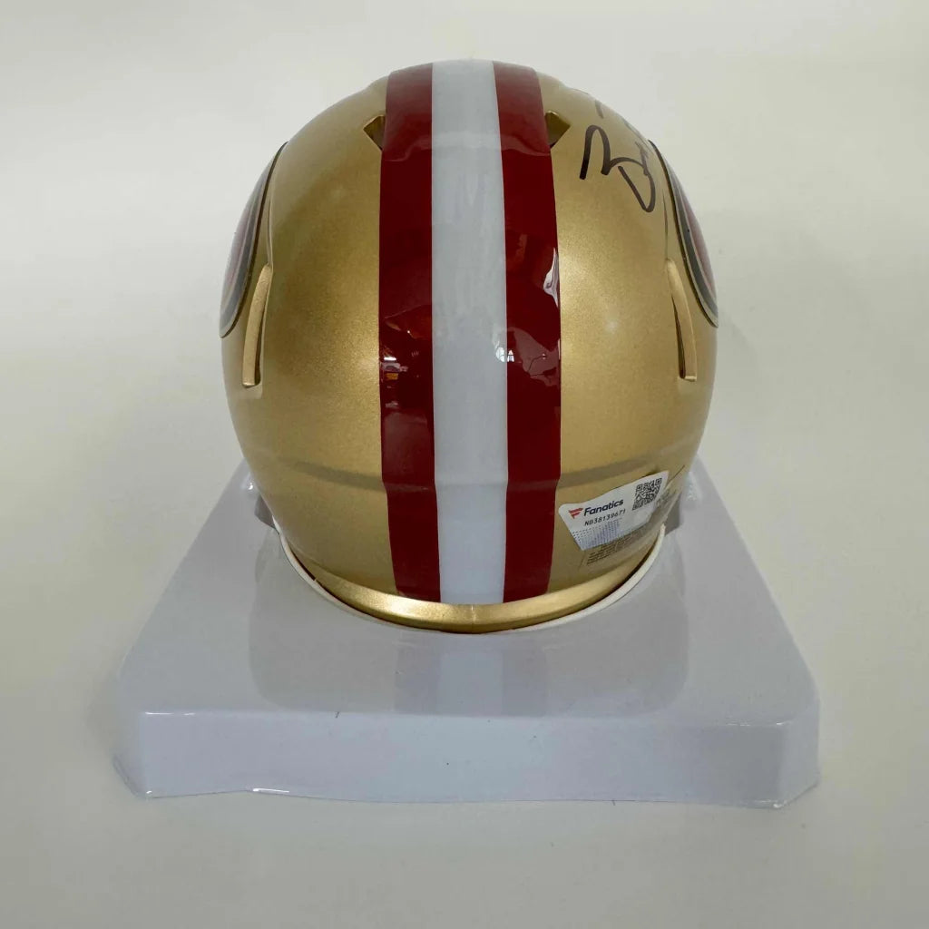 Gold San Francisco 49ers mini helmet with autograph and third party authentication