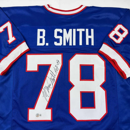 Autographed Bruce Smith HOF 09 Buffalo Blue Football Jersey Beckett BAS COA | Certified Authentic Signed Memorabilia | vintageantiquesgifts.com