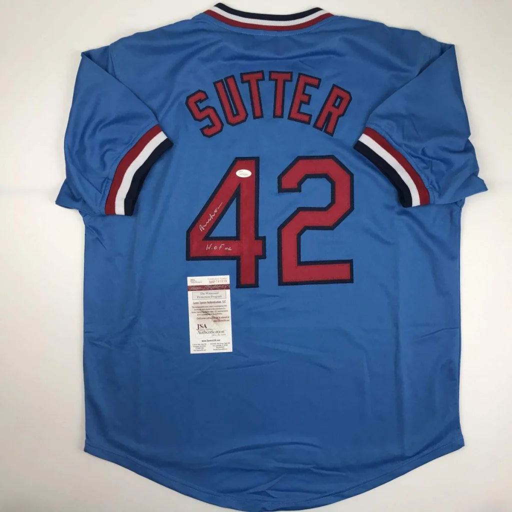 Blue custom jersey with Sutter 42 signature, authentic sports league collectible