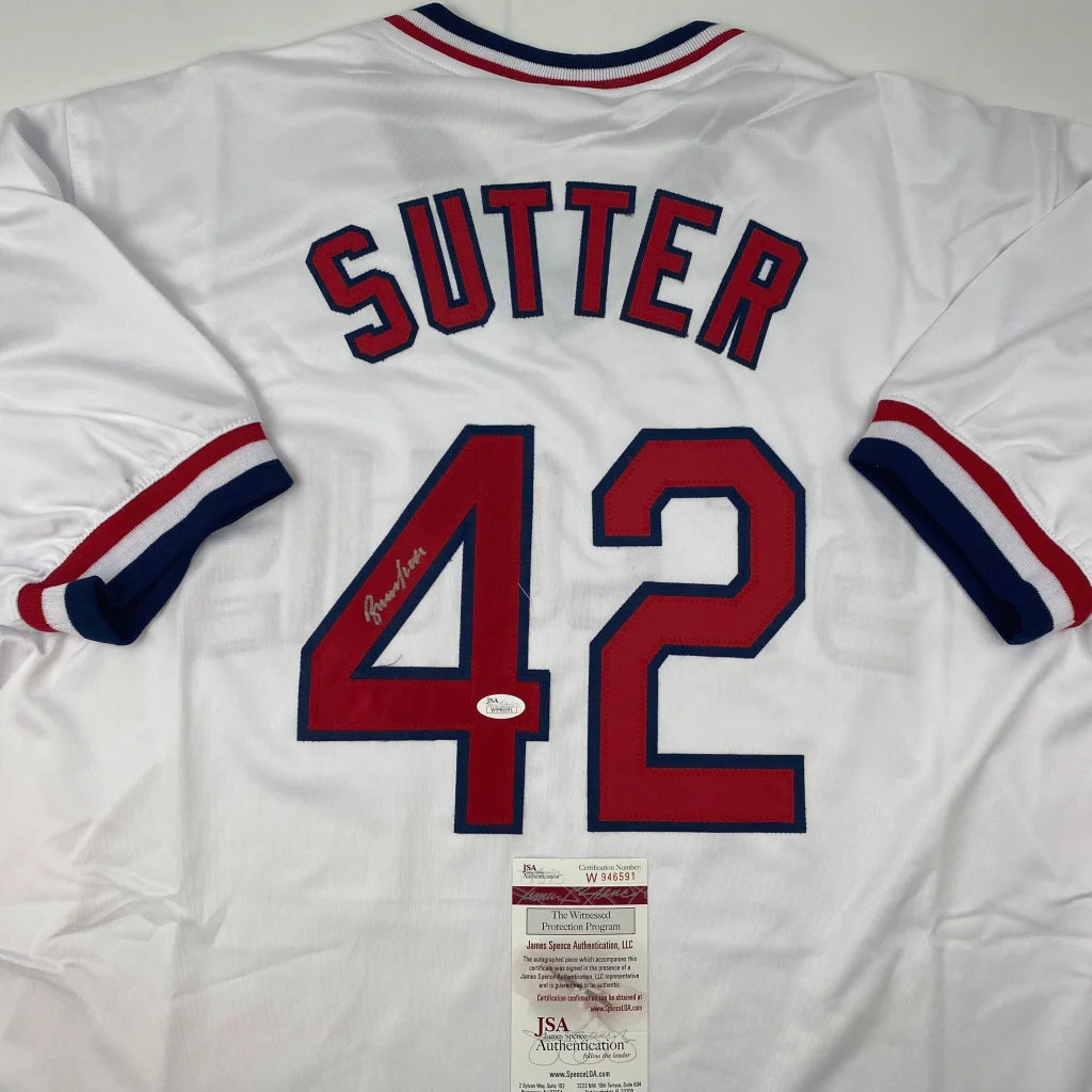 Autographed white baseball jersey with SUTTER 42 for authentic professional sports collectibles
